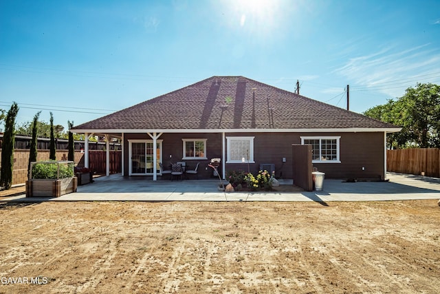 33430 E 133rd St, Pearblossom, CA 93553 - rear view of property featuring a patio, a fenced backyard, and a shingled roof