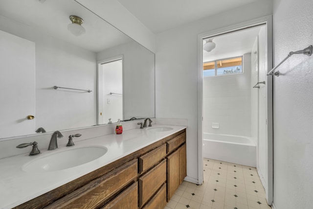 bathroom with vanity and tub / shower combination