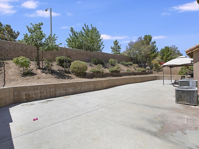 view of patio / terrace featuring a fenced backyard and a gazebo