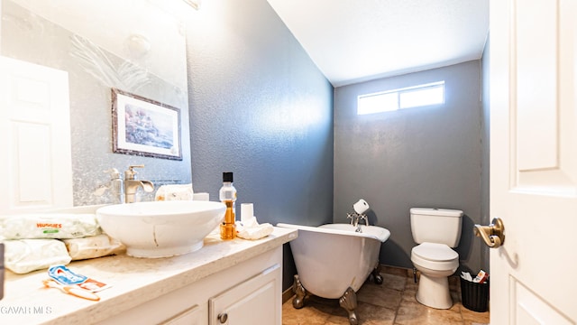 25739 Flatcreek St, Lancaster, CA 93536 - bathroom featuring a soaking tub, vanity, and toilet