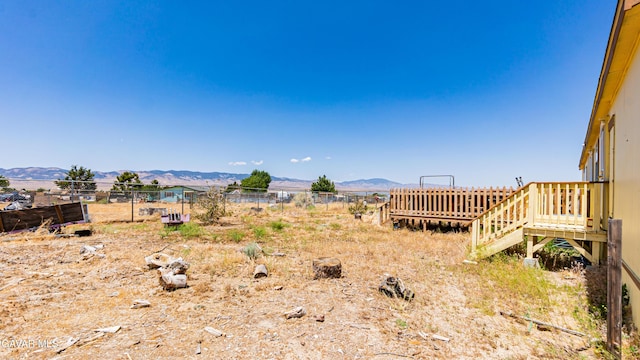 25739 Flatcreek St, Lancaster, CA 93536 - view of yard with a deck with mountain view
