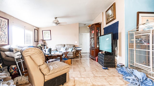 25739 Flatcreek St, Lancaster, CA 93536 - living room featuring ceiling fan and stone finish floors