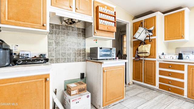 25739 Flatcreek St, Lancaster, CA 93536 - kitchen featuring light countertops and decorative backsplash