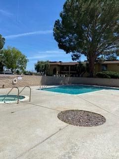 42925 W 15th St Unit 6, Lancaster, CA 93534 - pool with a patio and a fenced backyard