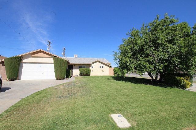 45581 Sancroft Ave, Lancaster, CA 93535 - ranch-style home featuring an attached garage, concrete driveway, a front lawn, and stucco siding