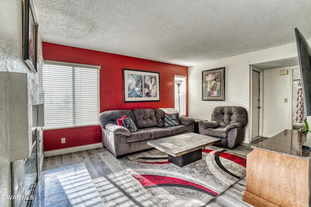 1306 Date Palm Dr, Palmdale, CA 93551 - living room featuring wood finished floors and a textured ceiling