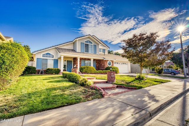 1306 Date Palm Dr, Palmdale, CA 93551 - traditional home with a garage, concrete driveway, a front lawn, a tile roof, and a porch
