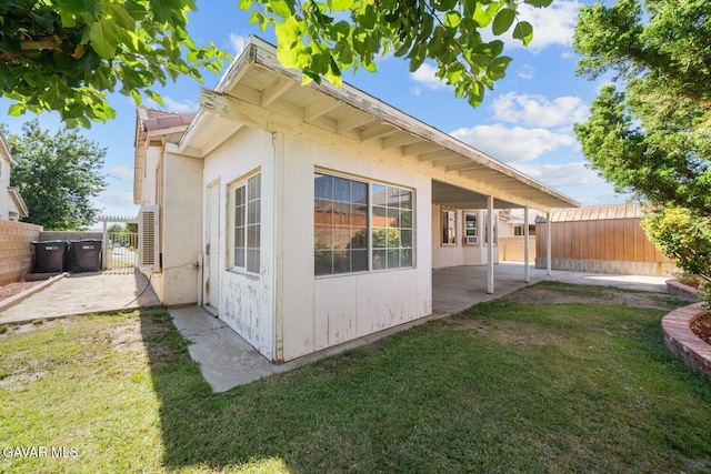 38160 Antibes Dr, Palmdale, CA 93552 - view of side of home featuring a gate and a patio area