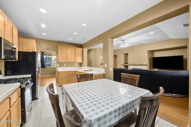 38160 Antibes Dr, Palmdale, CA 93552 - dining space with light tile patterned floors, recessed lighting, and ceiling fan