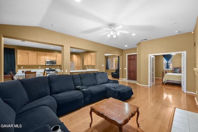38160 Antibes Dr, Palmdale, CA 93552 - living area with light wood-style floors, a ceiling fan, and vaulted ceiling