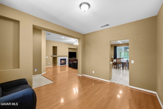 38160 Antibes Dr, Palmdale, CA 93552 - living room with a fireplace and light wood finished floors