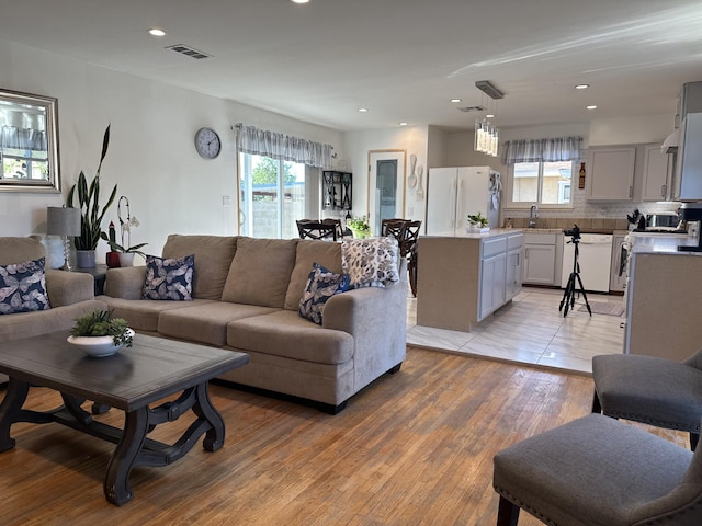 living room with light wood-type flooring