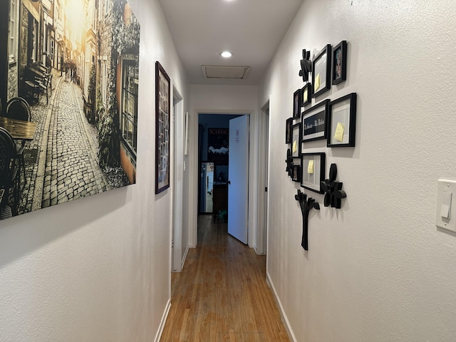 corridor featuring hardwood / wood-style flooring