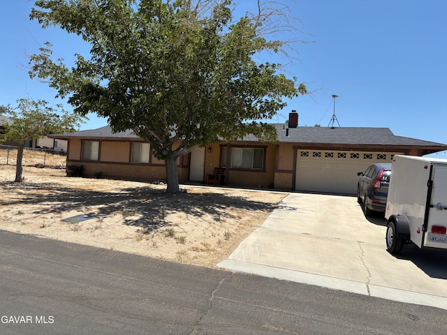 17306 Lakespring Ave, Palmdale, CA 93591 - single story home featuring an attached garage, concrete driveway, a chimney, and a shingled roof