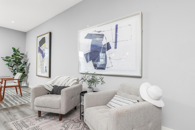 living area with light hardwood / wood-style flooring