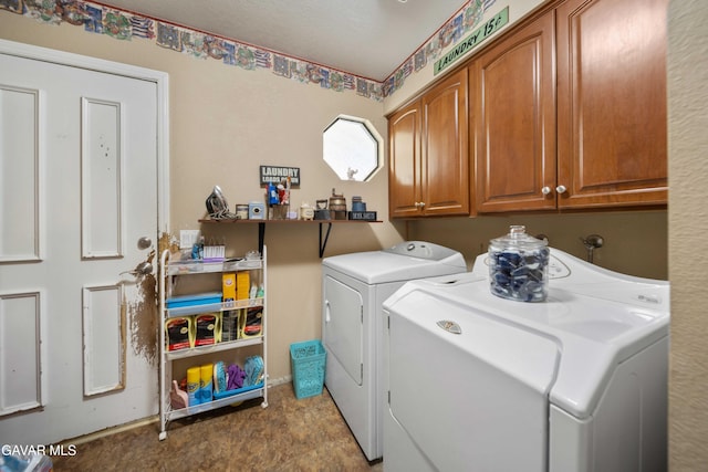 2747 Wilson Ct, Lancaster, CA 93536 - laundry area featuring washer and dryer and cabinet space