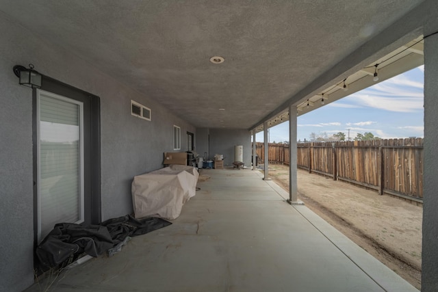 view of patio with fence