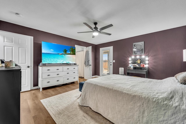 bedroom with ceiling fan and wood finished floors