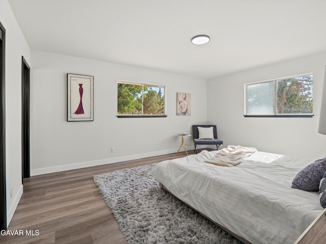 2350 W W Ave N Unit 12, Palmdale, CA 93551 - bedroom with wood finished floors and baseboards