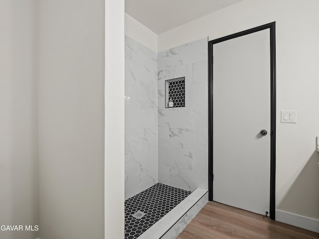 2350 W W Ave N Unit 12, Palmdale, CA 93551 - bathroom with a marble finish shower and wood finished floors
