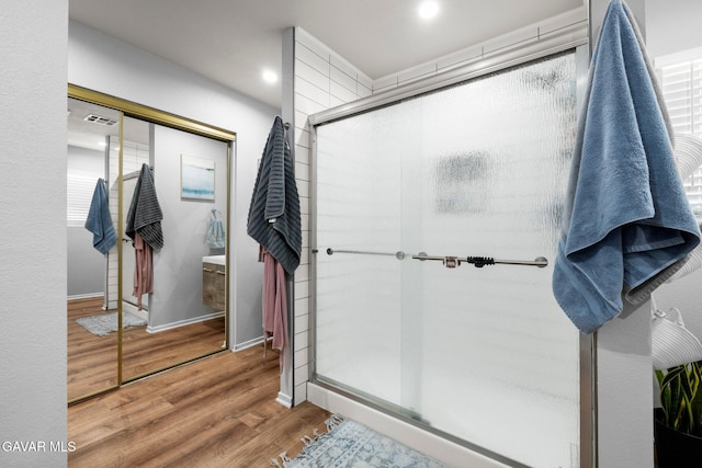 38030 Lido Dr, Palmdale, CA 93552 - full bath with a stall shower, wood finished floors, and recessed lighting