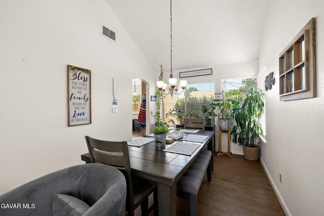 38030 Lido Dr, Palmdale, CA 93552 - dining area with a chandelier, wood finished floors, arched walkways, and high vaulted ceiling