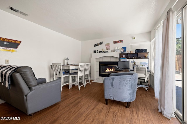 38030 Lido Dr, Palmdale, CA 93552 - living area with wood finished floors and a tiled fireplace