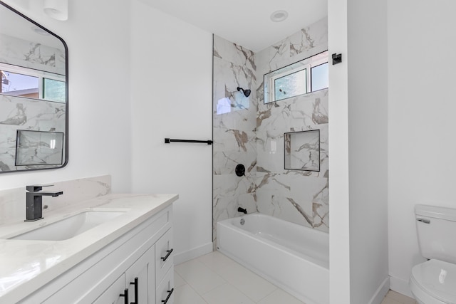 full bathroom with vanity, toilet, tub / shower combination, and baseboards