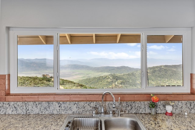 23761 El Rancho Dr, Tehachapi, CA 93561 - kitchen with a sink and light stone countertops