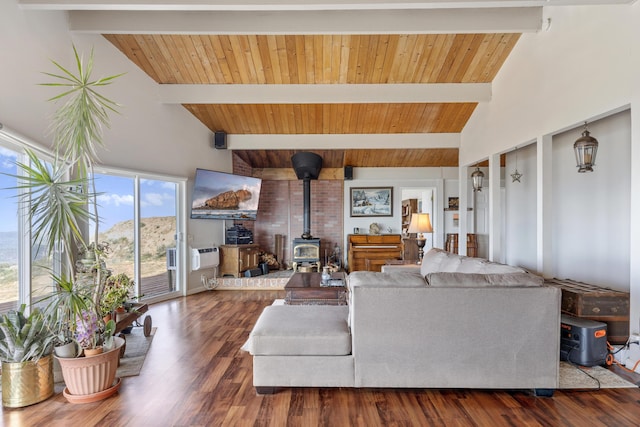 23761 El Rancho Dr, Tehachapi, CA 93561 - living area featuring a wood stove, wood finished floors, high vaulted ceiling, and wooden ceiling with exposed beams