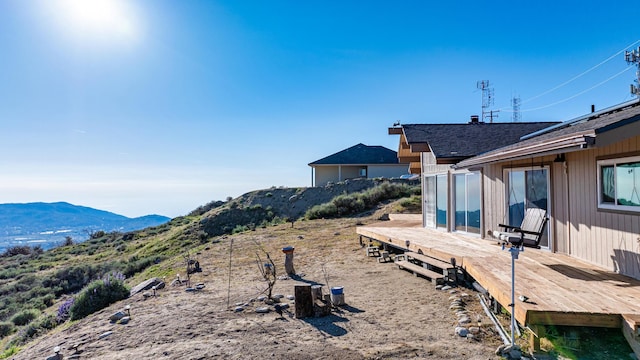 23761 El Rancho Dr, Tehachapi, CA 93561 - view of yard with a deck with mountain view