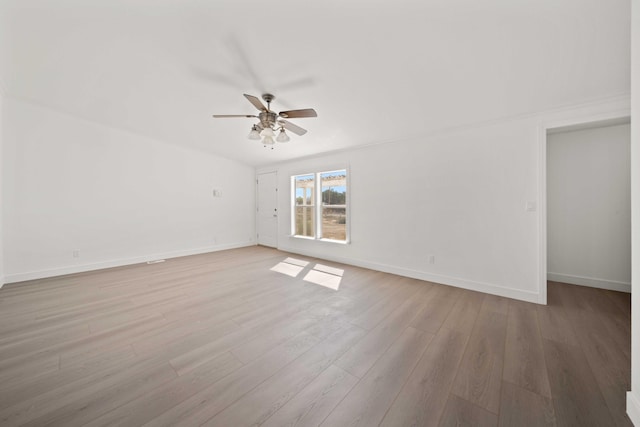 unfurnished room with light hardwood / wood-style floors and ceiling fan