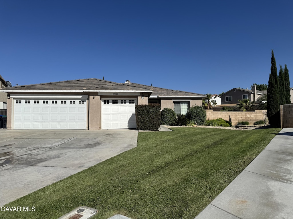 39300 Kennedy Dr, Palmdale, CA 93551 - ranch-style home featuring concrete driveway, a garage, and stucco siding