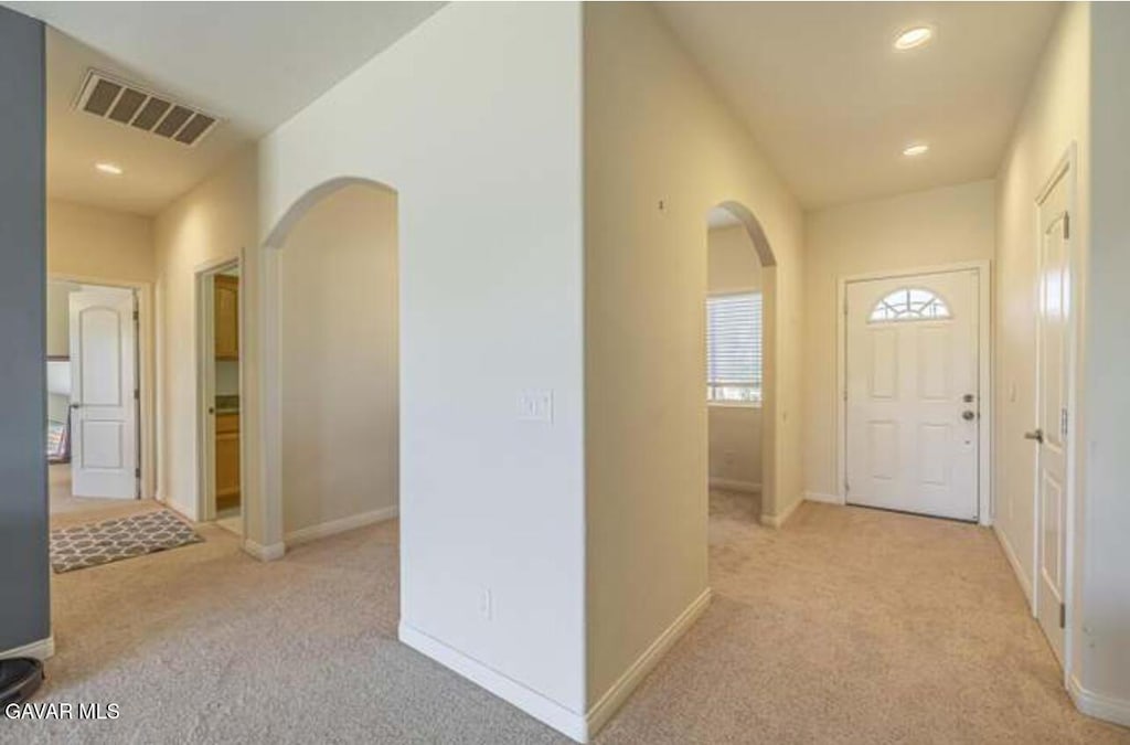 8400 Dogwood Ave, California City, CA 93505 - carpeted entryway with arched walkways and recessed lighting