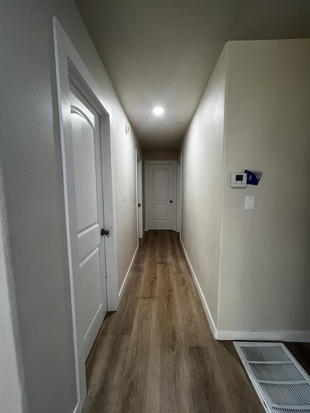 hall featuring dark hardwood / wood-style flooring