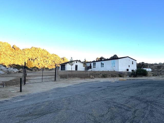 40004 171th Street E, St, Lake Los Angeles, CA 93591 - view of side of home featuring a gate