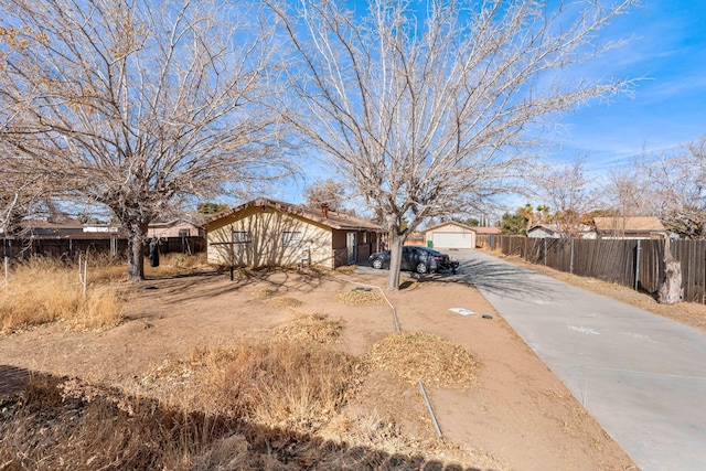 ranch-style home with a garage