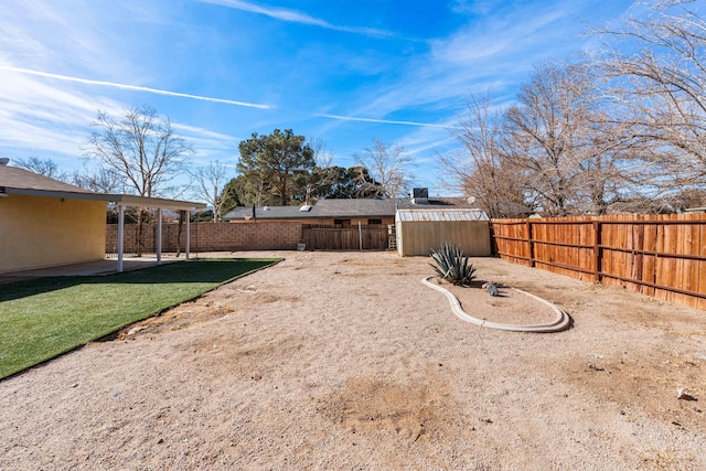 view of yard with a shed