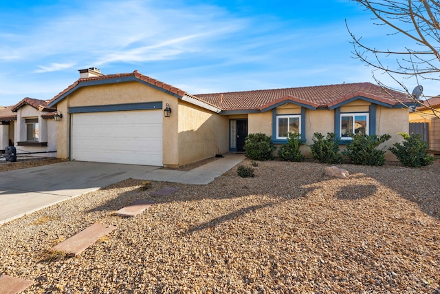 ranch-style home featuring a garage