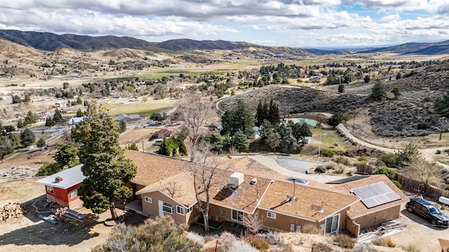 bird's eye view with a mountain view