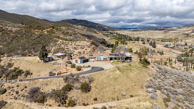 drone / aerial view featuring a mountain view