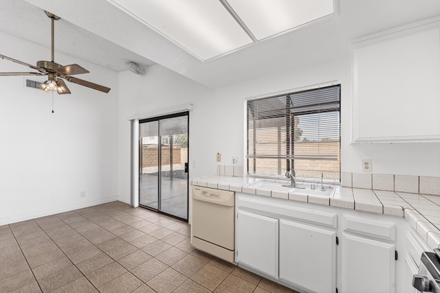 37756 E 45th St, Palmdale, CA 93552 - kitchen with dishwasher, ceiling fan, a sink, and white cabinetry
