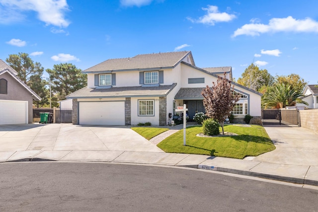 front facade with a front yard and a garage