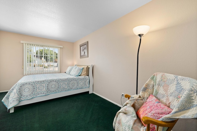 bedroom featuring dark carpet