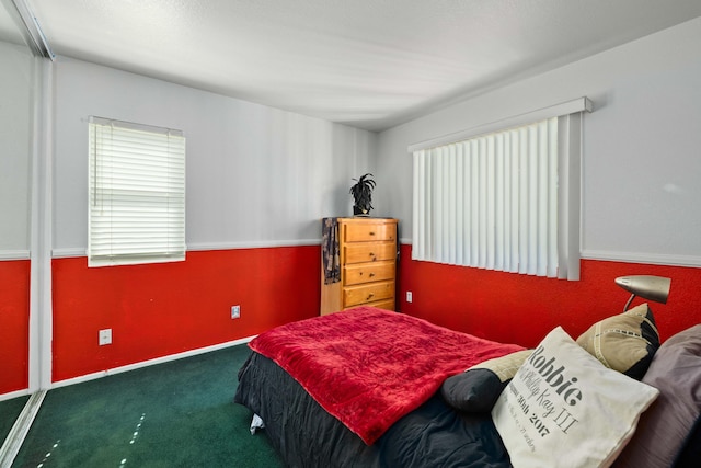 bedroom featuring carpet