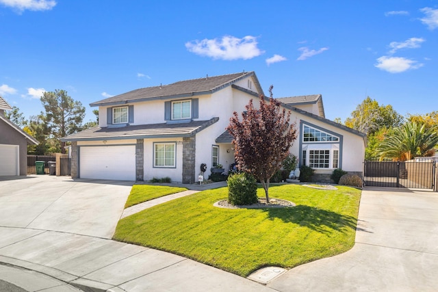 view of front property with a garage and a front lawn