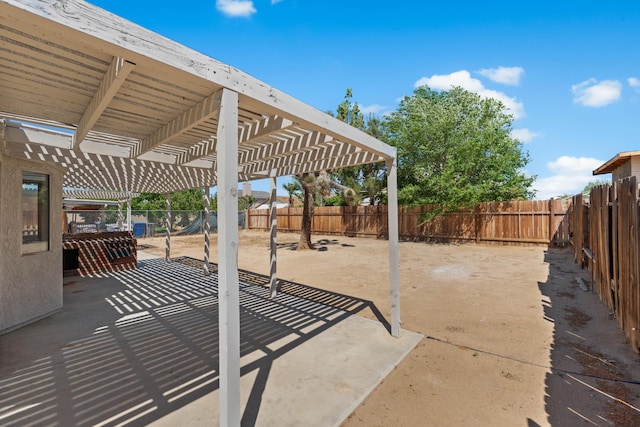 view of patio featuring a fenced backyard and a pergola