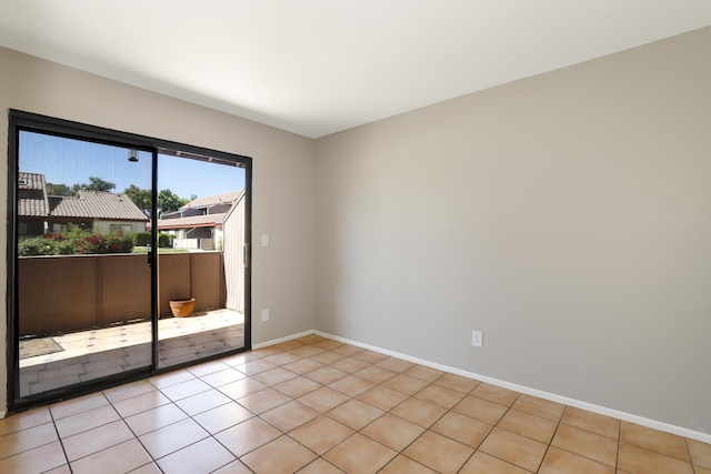 43334 W 32nd St Unit 12, Lancaster, CA 93536 - unfurnished room featuring baseboards and light tile patterned flooring