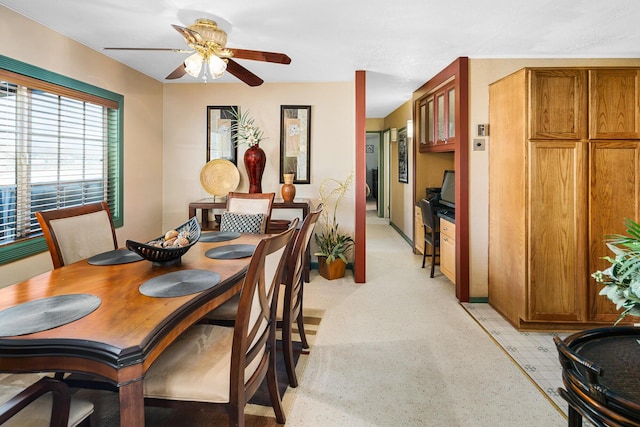 dining area with ceiling fan