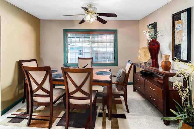 dining space with ceiling fan